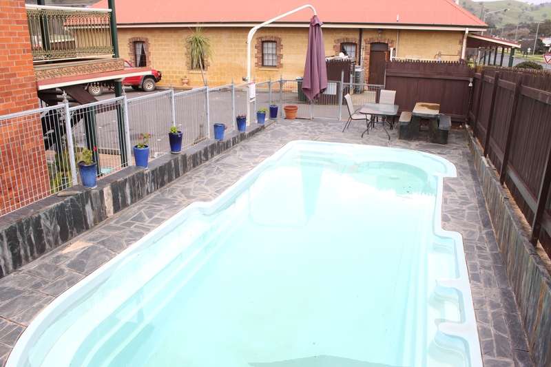 Swimming pool and spa at Poet's Recall Motel